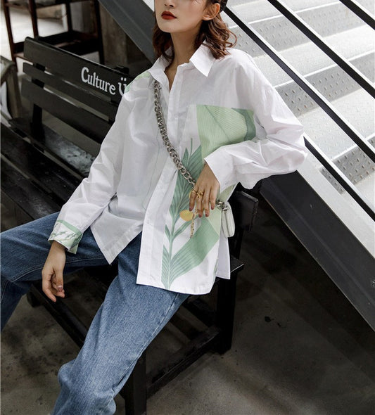 Designer blouse with floral pattern print, women fashion white shirt in modern style with asymmetric graphics for casual or formal