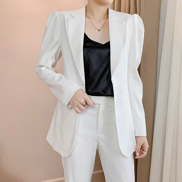 Woman white pantsuit, designer tied-waist puff-sleeve blazer + pants with belt minimalist style formal work office wedding event party gift